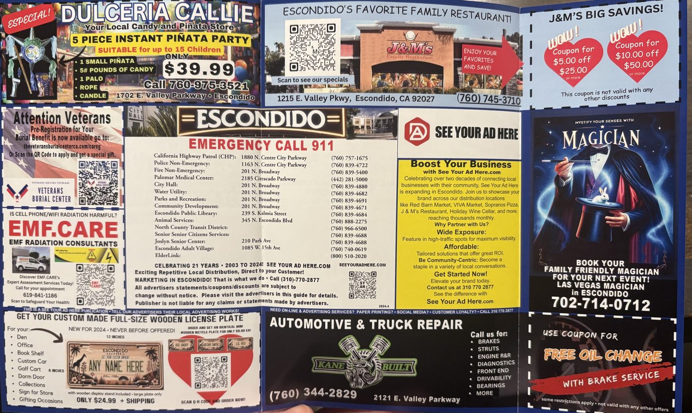 The folded guide opened: J&M's Family Restaurant, Dulceria Callie, EMF.CARE, Veterans Burial Center, a magician, Kane Built and a free oil change coupon.